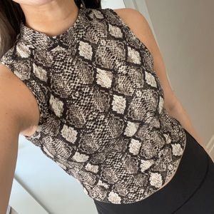 Snakeskin sleeveless turtleneck tank